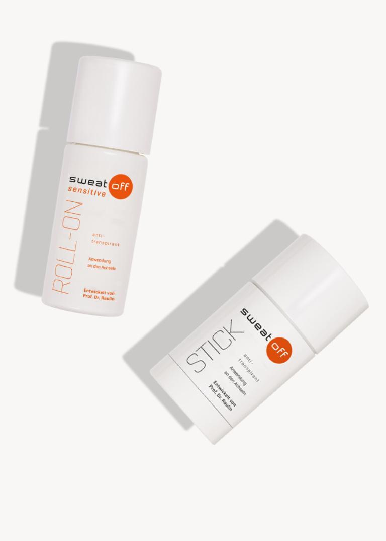 Antitranspirant Sensitive Roll-On und Stick liegend auf weißem Hintergrund